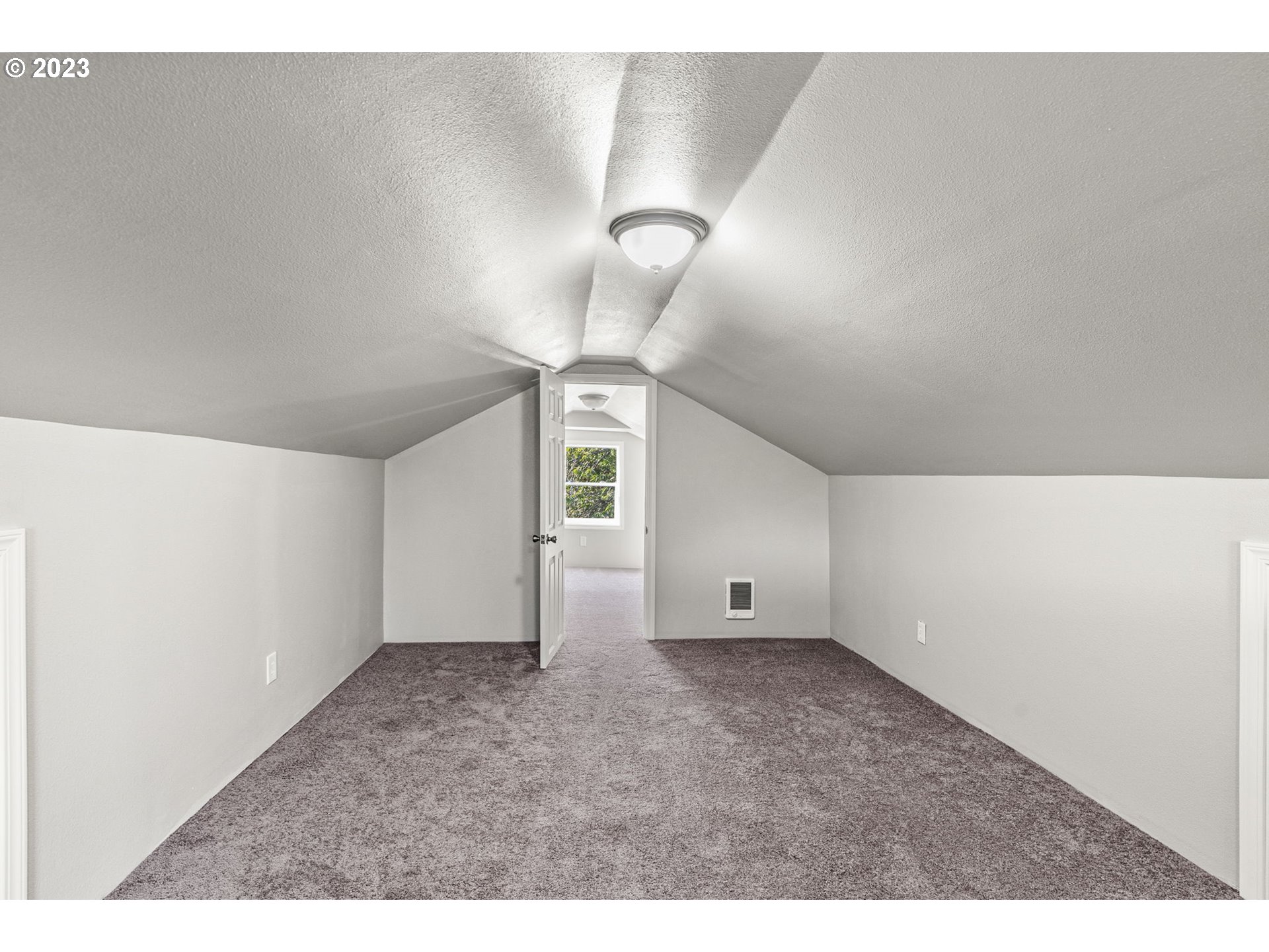 2808 Florida Street Longview, WA 98632 - Photo 11 of 20 a view of an empty room with a window