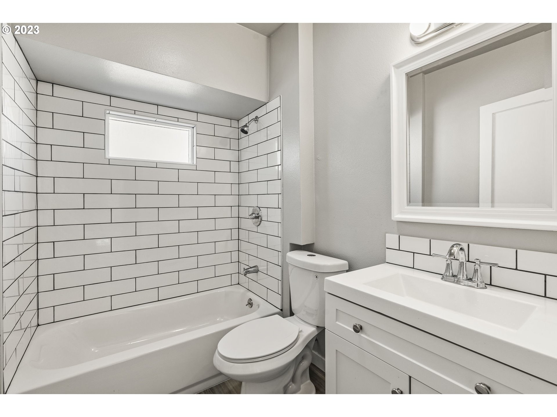2808 Florida Street Longview, WA 98632 - Photo 13 of 20 a bathroom with a sink toilet and shower