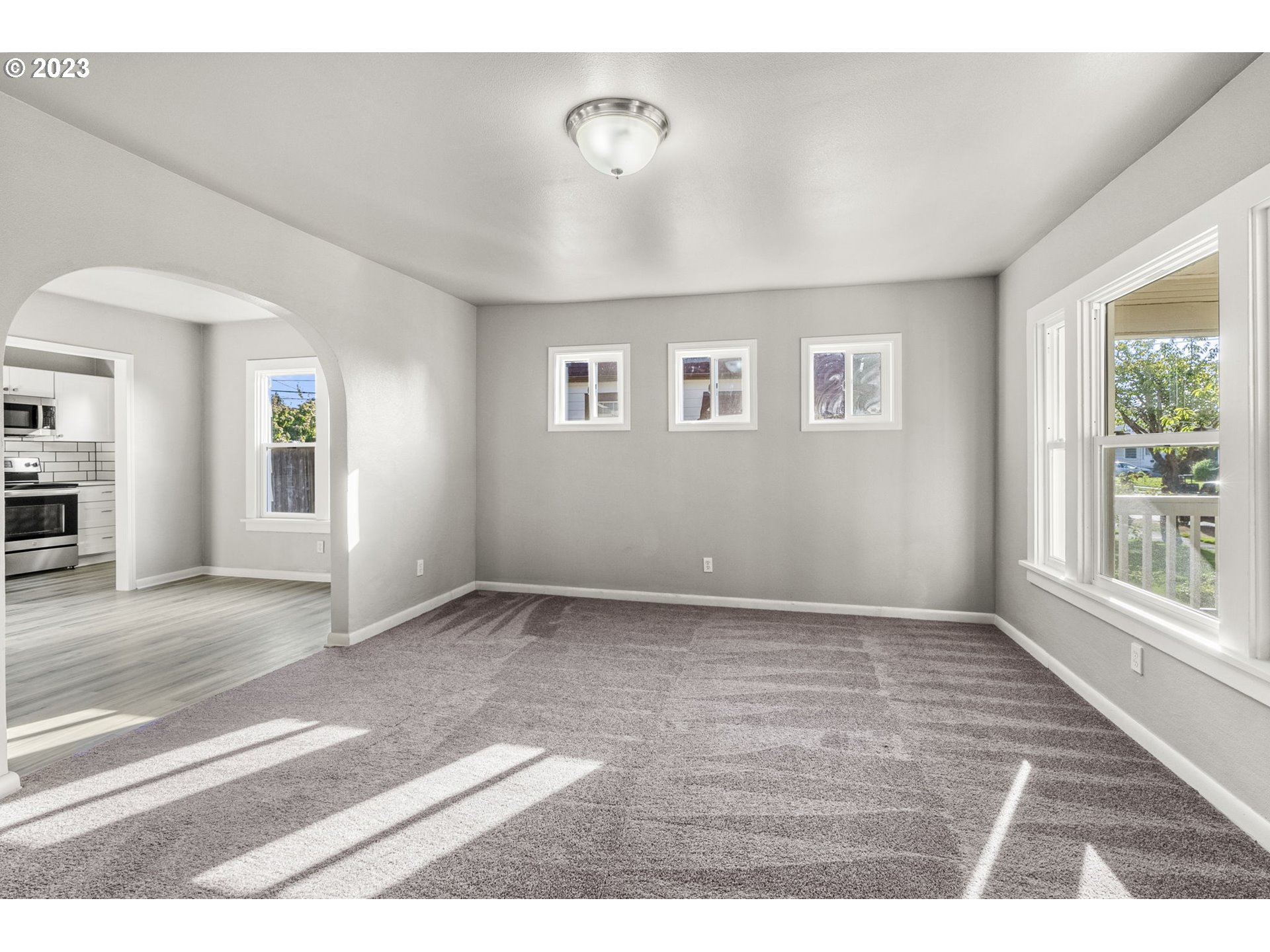 2808 Florida Street Longview, WA 98632 - Photo 4 of 20 a view of an empty room with a window