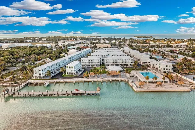 a view of a city with an ocean