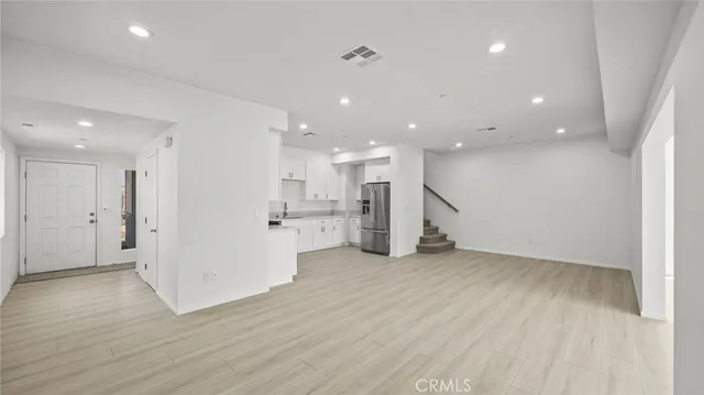 a view of kitchen with wooden floor
