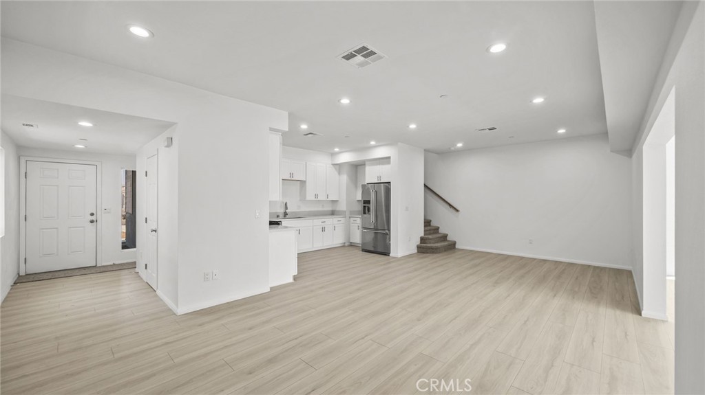 13105 Via Tuscany Riverside, CA 92503 - Photo 17 of 51 a view of kitchen with wooden floor