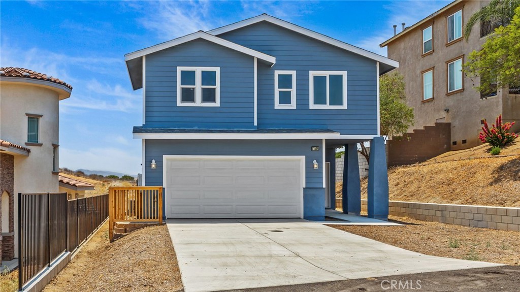 13105 Via Tuscany Riverside, CA 92503 - Photo 2 of 51 a front view of a house with yard