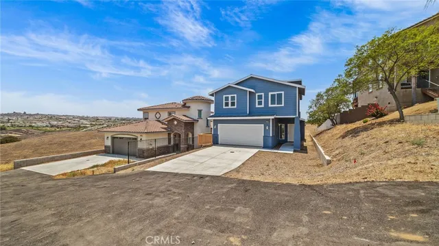 a view of a house with a ocean view
