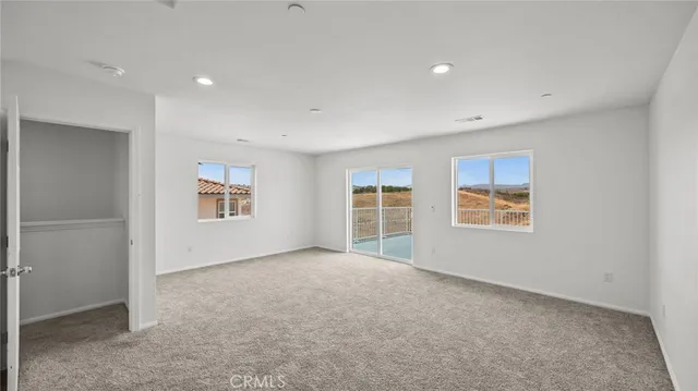 an empty room with windows