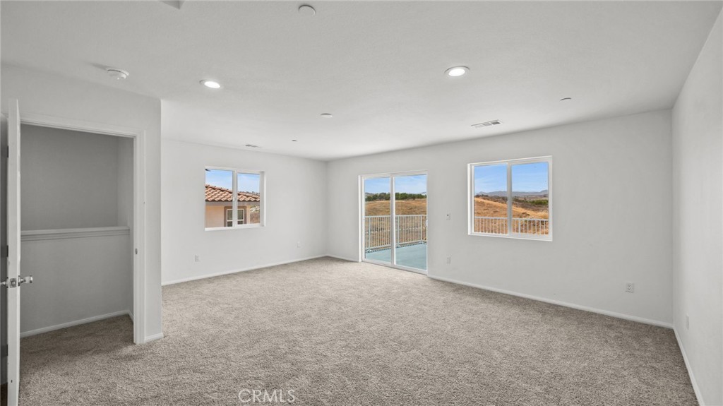 13105 Via Tuscany Riverside, CA 92503 - Photo 32 of 51 an empty room with windows