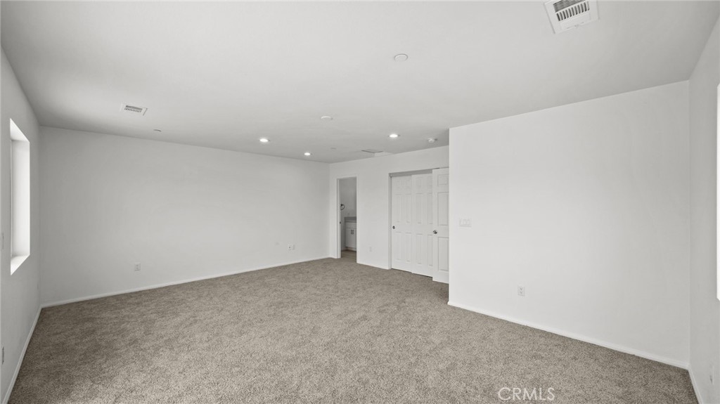 13105 Via Tuscany Riverside, CA 92503 - Photo 33 of 51 an empty room with a natural light