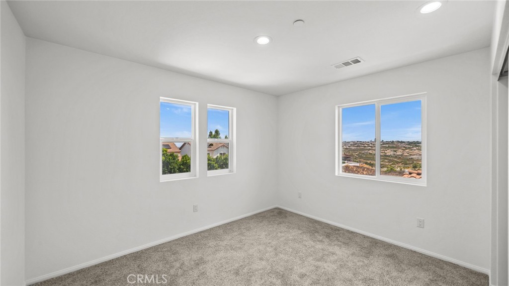 13105 Via Tuscany Riverside, CA 92503 - Photo 40 of 51 an empty room with a window