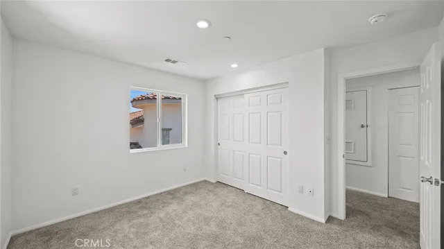 a bathroom with a sink double vanity and tub