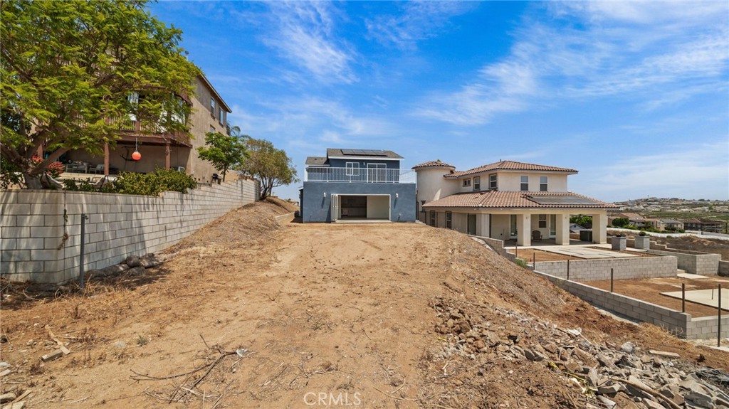 13105 Via Tuscany Riverside, CA 92503 - Photo 48 of 51 a front view of a house with a yard