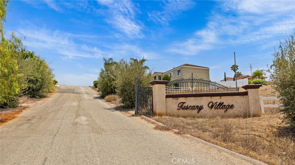 13105 Via Tuscany Riverside, CA 92503 - Photo 50 of 51 a view of a street with a building in the background