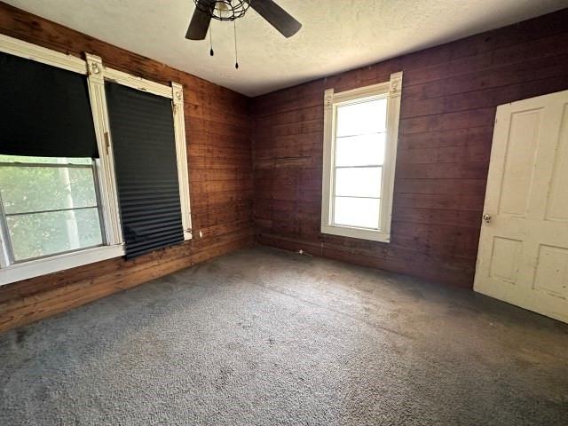 202 Mill Street Valley View, TX 76272 - Photo 14 of 22 a view of a livingroom with a dishwasher and a window