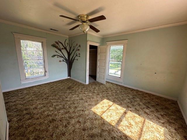 202 Mill Street Valley View, TX 76272 - Photo 16 of 22 a view of empty room with wooden floor and fan