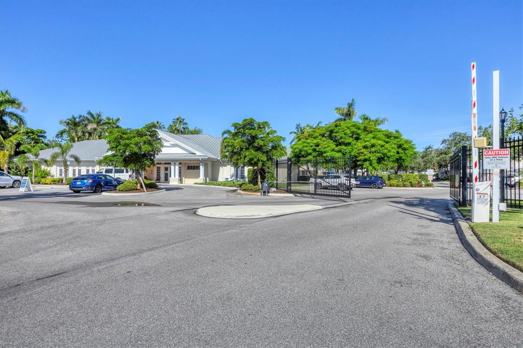 3605 54th Drive West, Unit 104 Bradenton, FL 34210 - Photo 37 of 65 a view of a street with cars