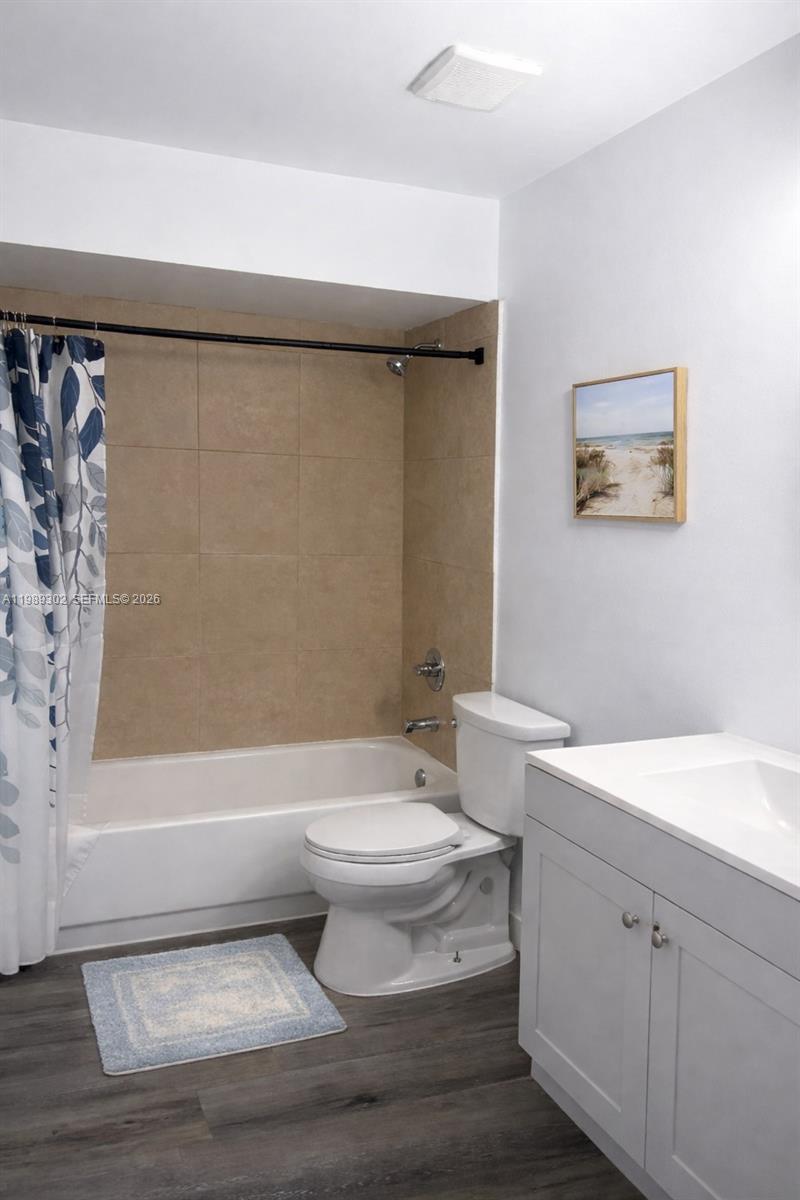 441 Northwest 98th Court, Unit 441 Miami, FL 33172 - Photo 13 of 18 a bathroom with a toilet a sink and bathtub