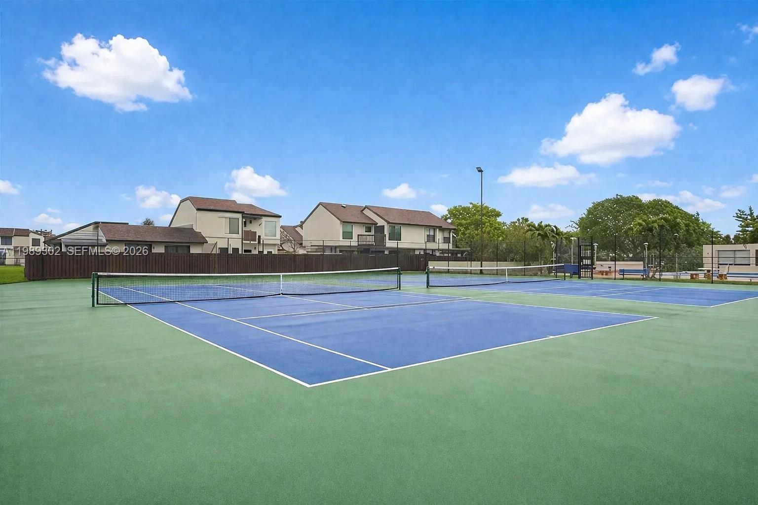 441 Northwest 98th Court, Unit 441 Miami, FL 33172 - Photo 18 of 18 a view of a tennis court