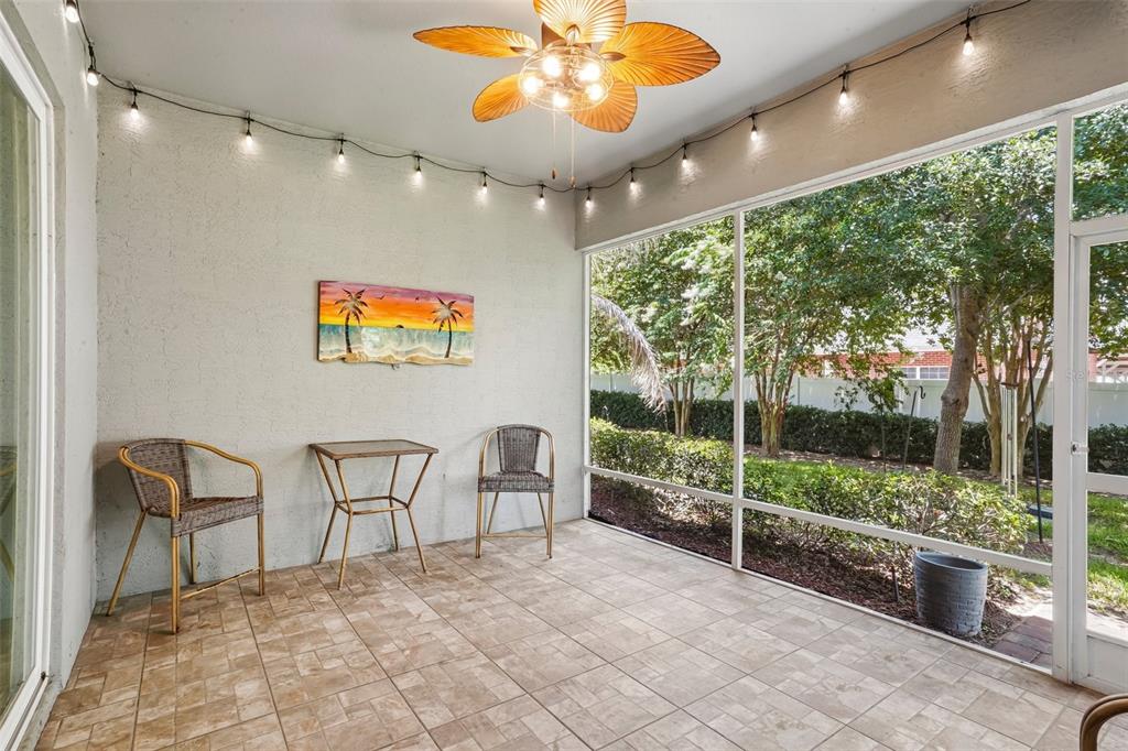 10339 Addison Shore Way Oxford, FL 34484 - Photo 52 of 54 a view of a dining room with furniture wooden floor and a chandelier