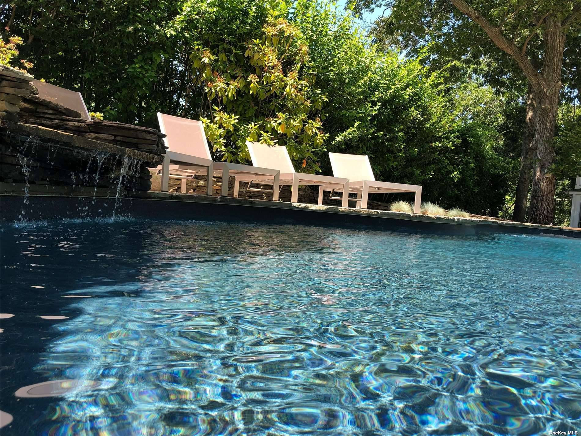 3752 Noyack Road Sag Harbor, NY 11963 - Photo 8 of 28 a view of a house with yard and sitting area