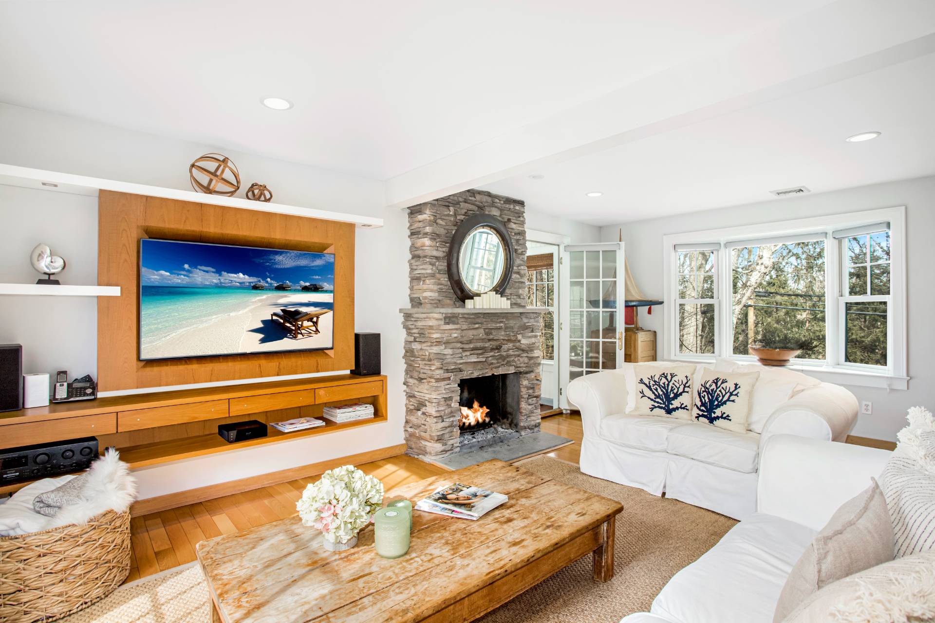 3752 Noyack Road Sag Harbor, NY 11963 - Photo 9 of 28 a living room with furniture and a fireplace