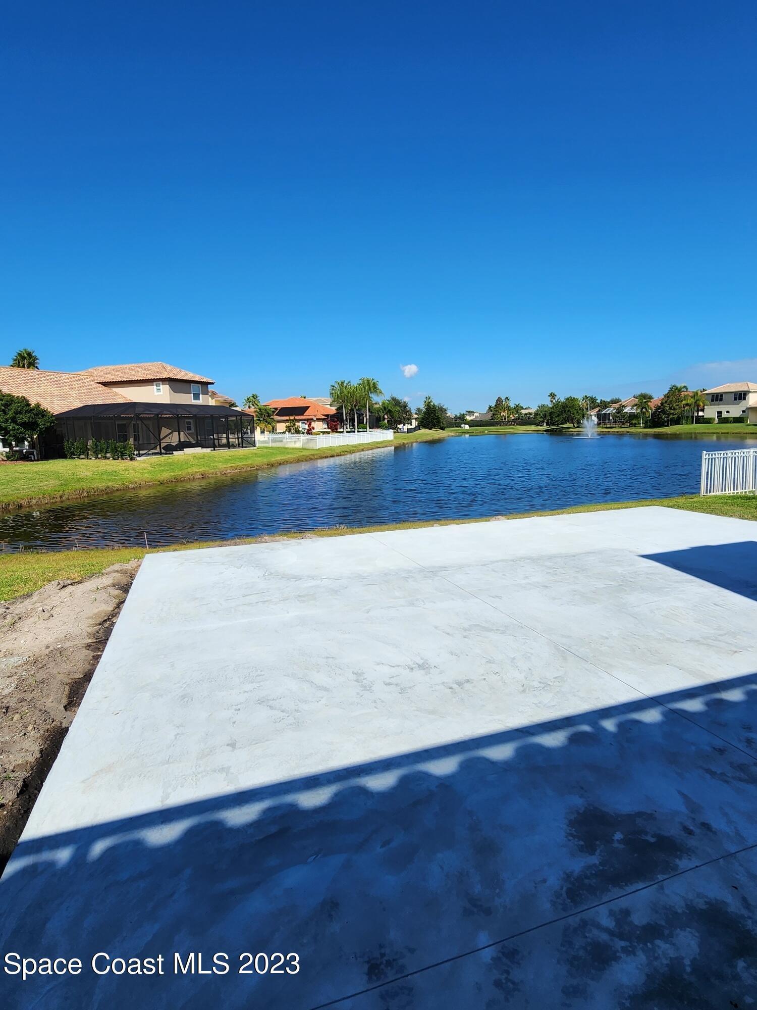 4124 Waterloo Place Melbourne, FL 32940 - Photo 29 of 32 a view of lake view and mountain view