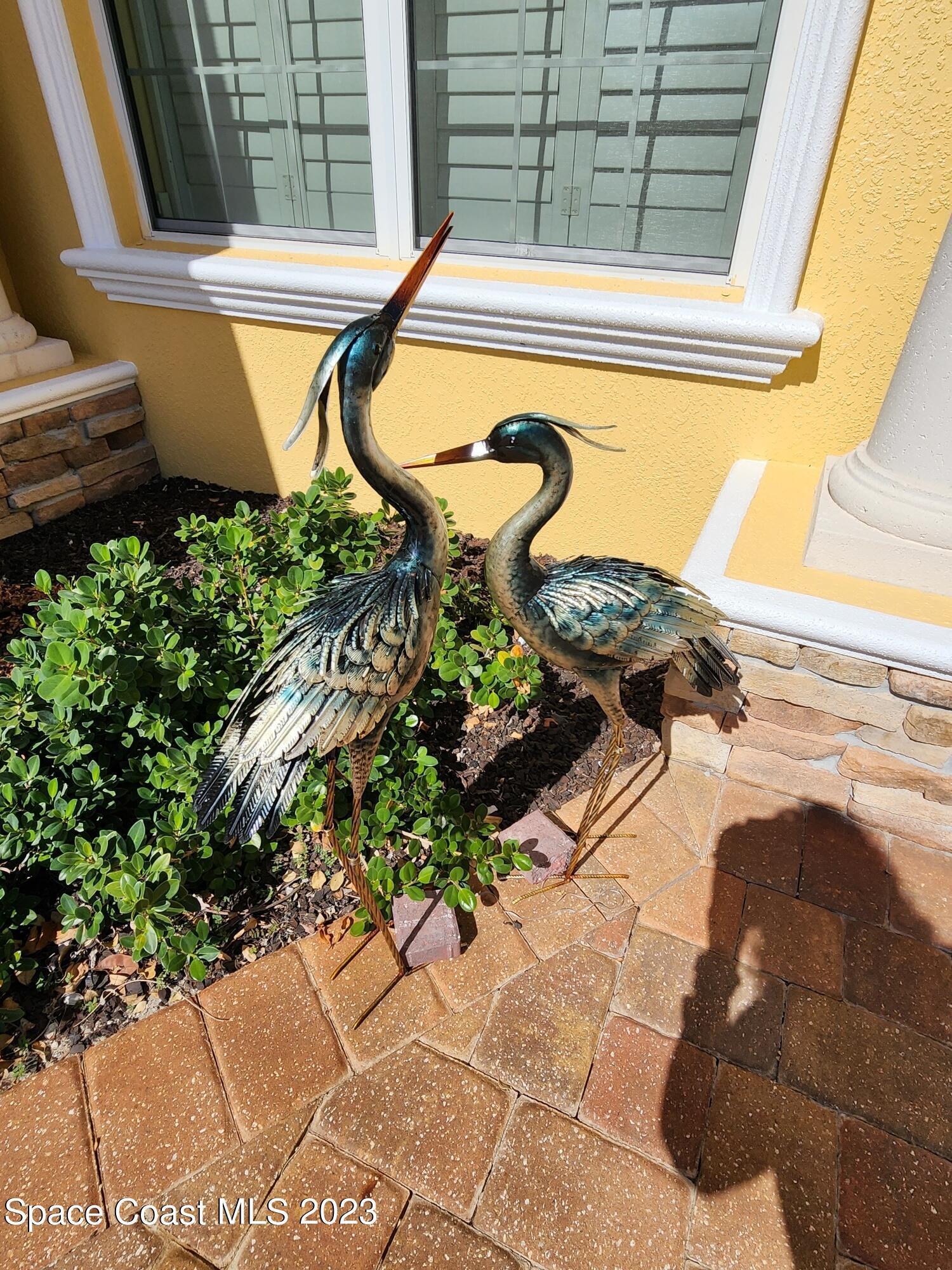 4124 Waterloo Place Melbourne, FL 32940 - Photo 4 of 32 a view of a swimming pool with a lounge chairs