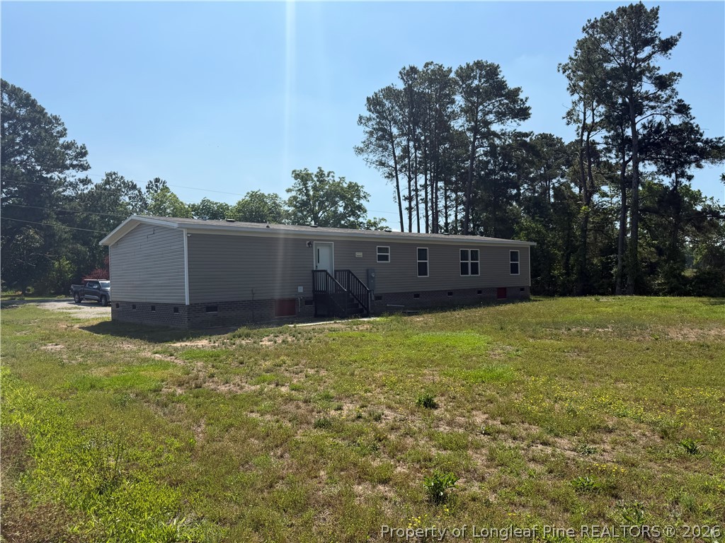4339 Saddletree Road Lumberton, NC 28360 - Photo 6 of 23 a view of a backyard