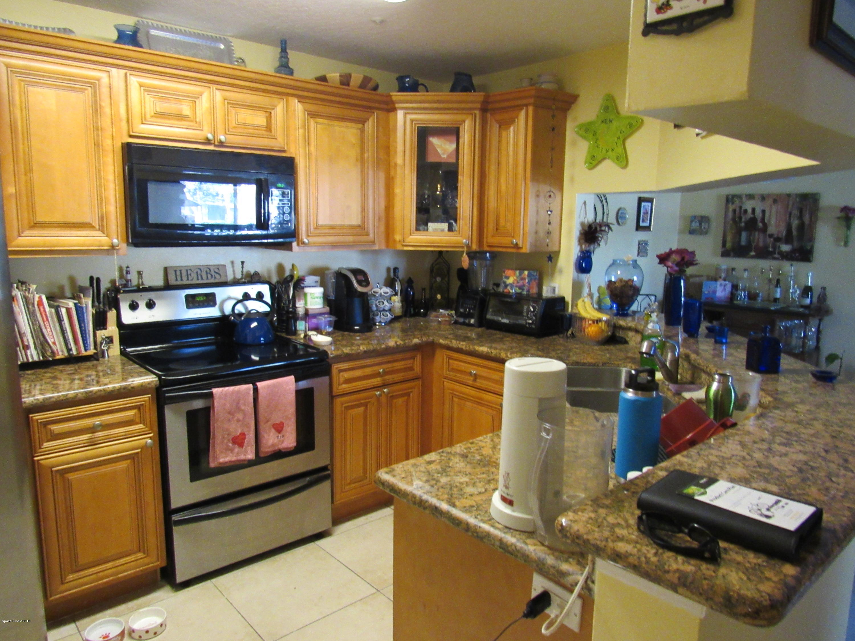 7667 North Wickham Road, Unit 111 Melbourne, FL 32940 - Photo 2 of 21 Updated Kitchen