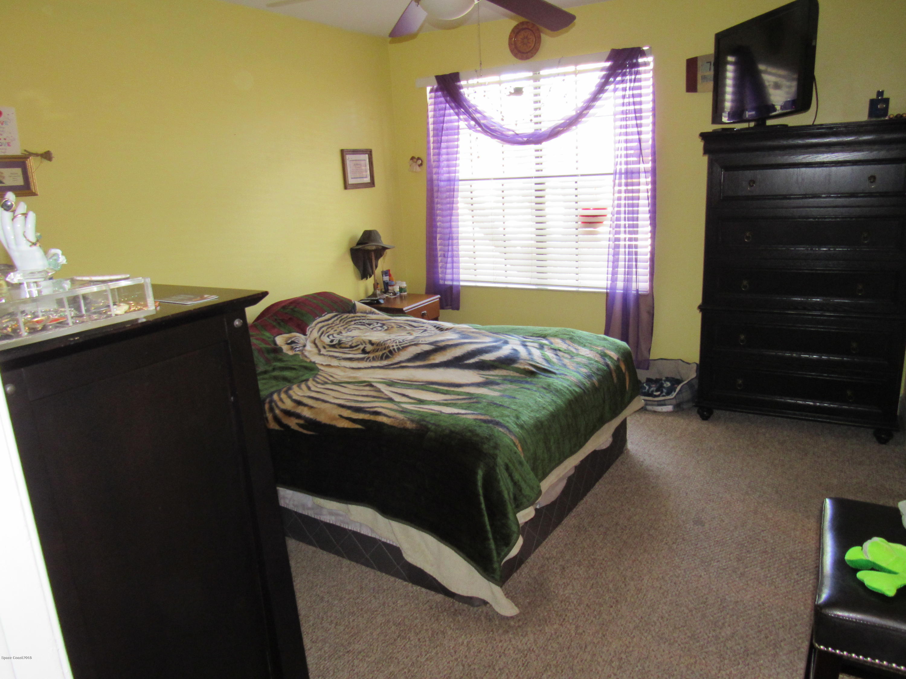 7667 North Wickham Road, Unit 111 Melbourne, FL 32940 - Photo 14 of 21 master bedroom