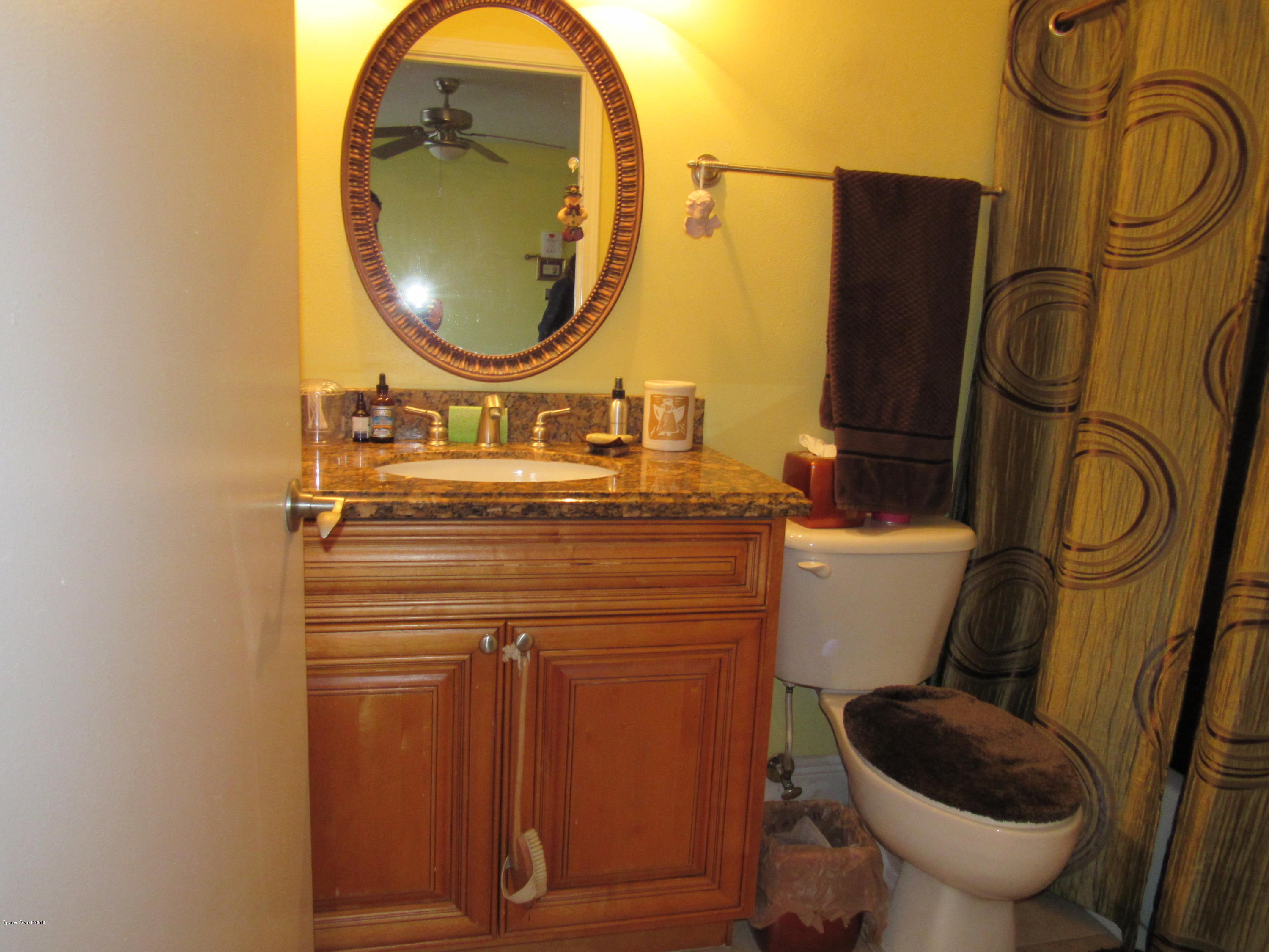 7667 North Wickham Road, Unit 111 Melbourne, FL 32940 - Photo 16 of 21 master bathroom