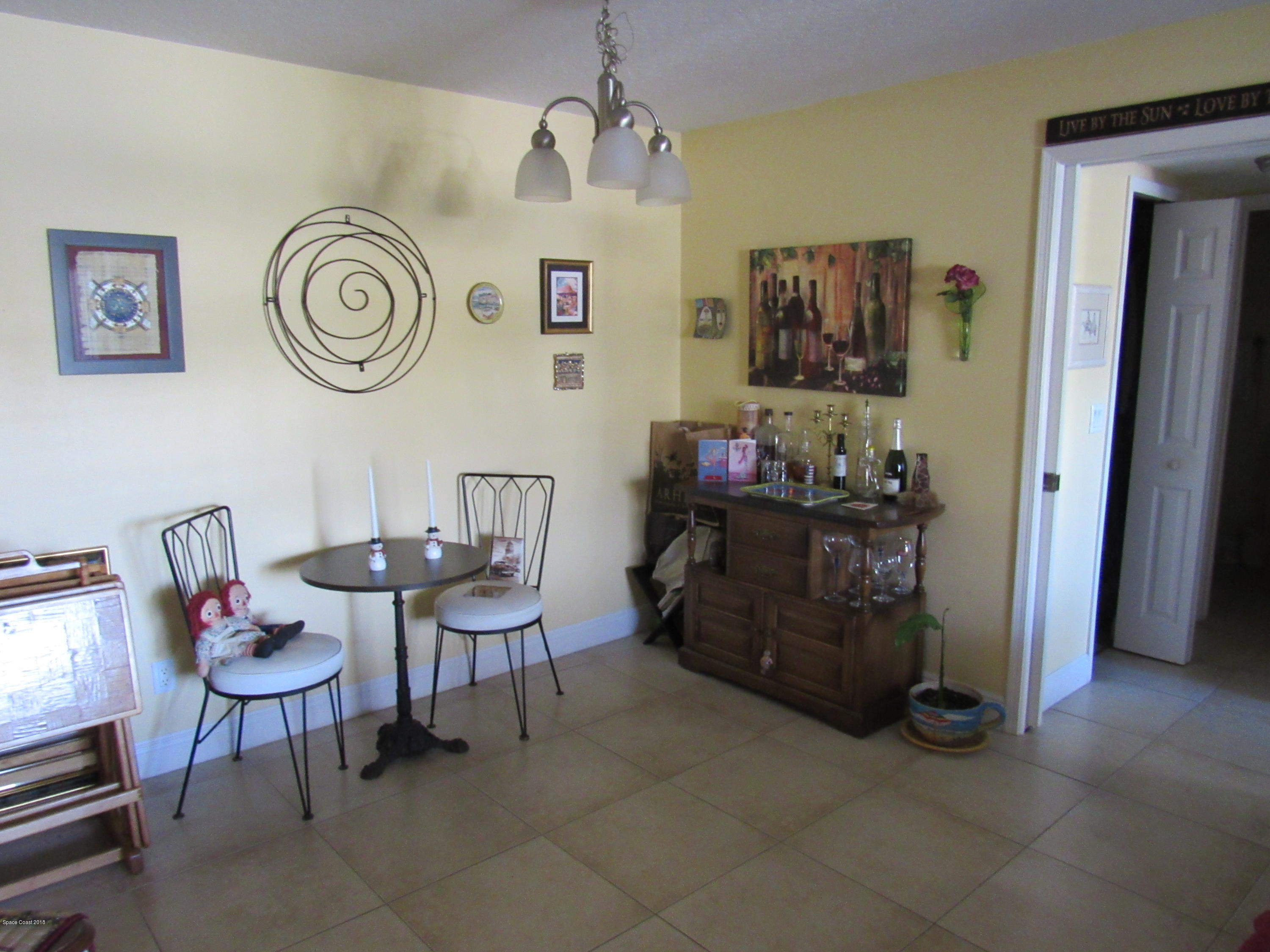 7667 North Wickham Road, Unit 111 Melbourne, FL 32940 - Photo 4 of 21 Dining Area