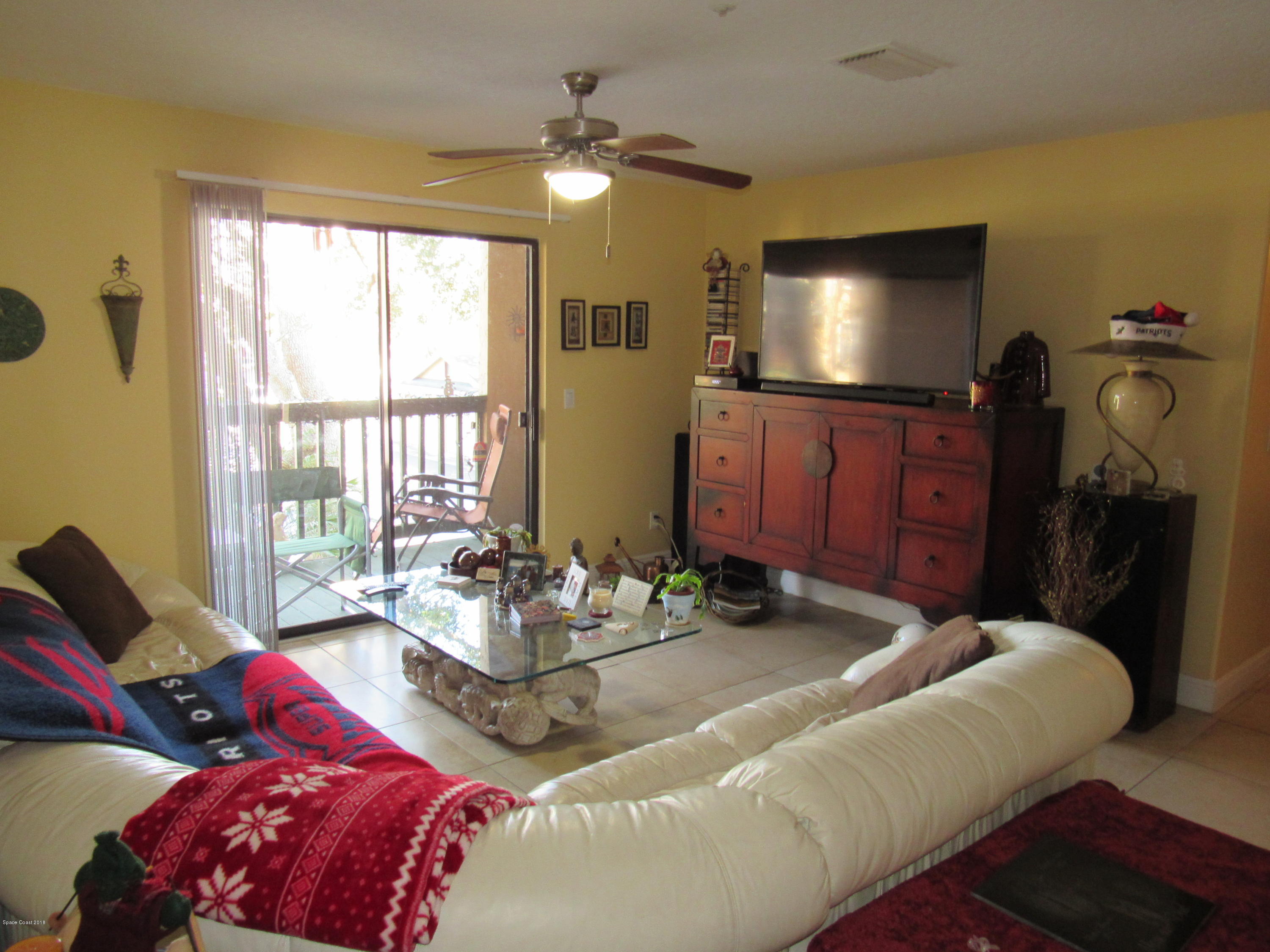 7667 North Wickham Road, Unit 111 Melbourne, FL 32940 - Photo 5 of 21 living Room