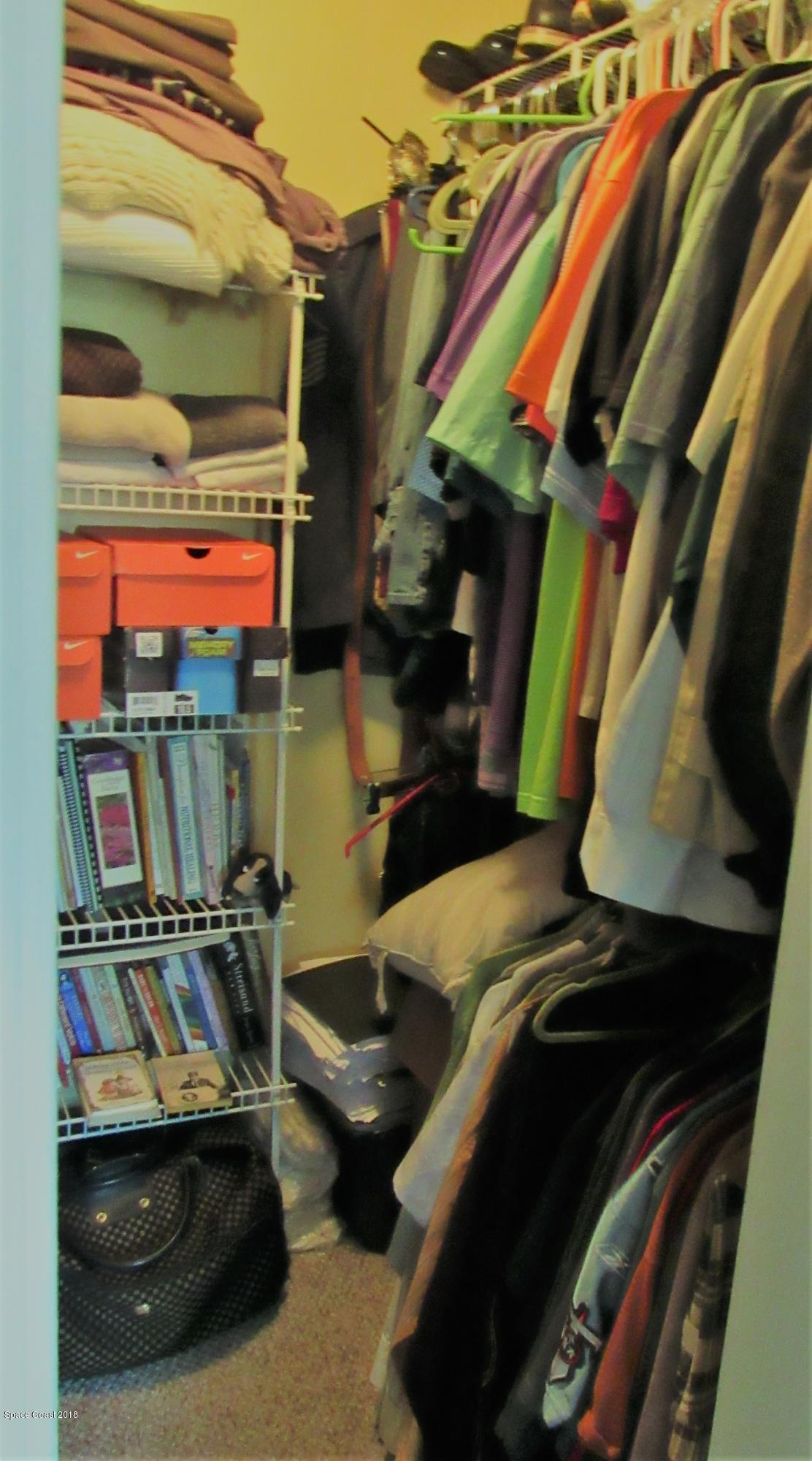 7667 North Wickham Road, Unit 111 Melbourne, FL 32940 - Photo 7 of 21 Closet in Hallway