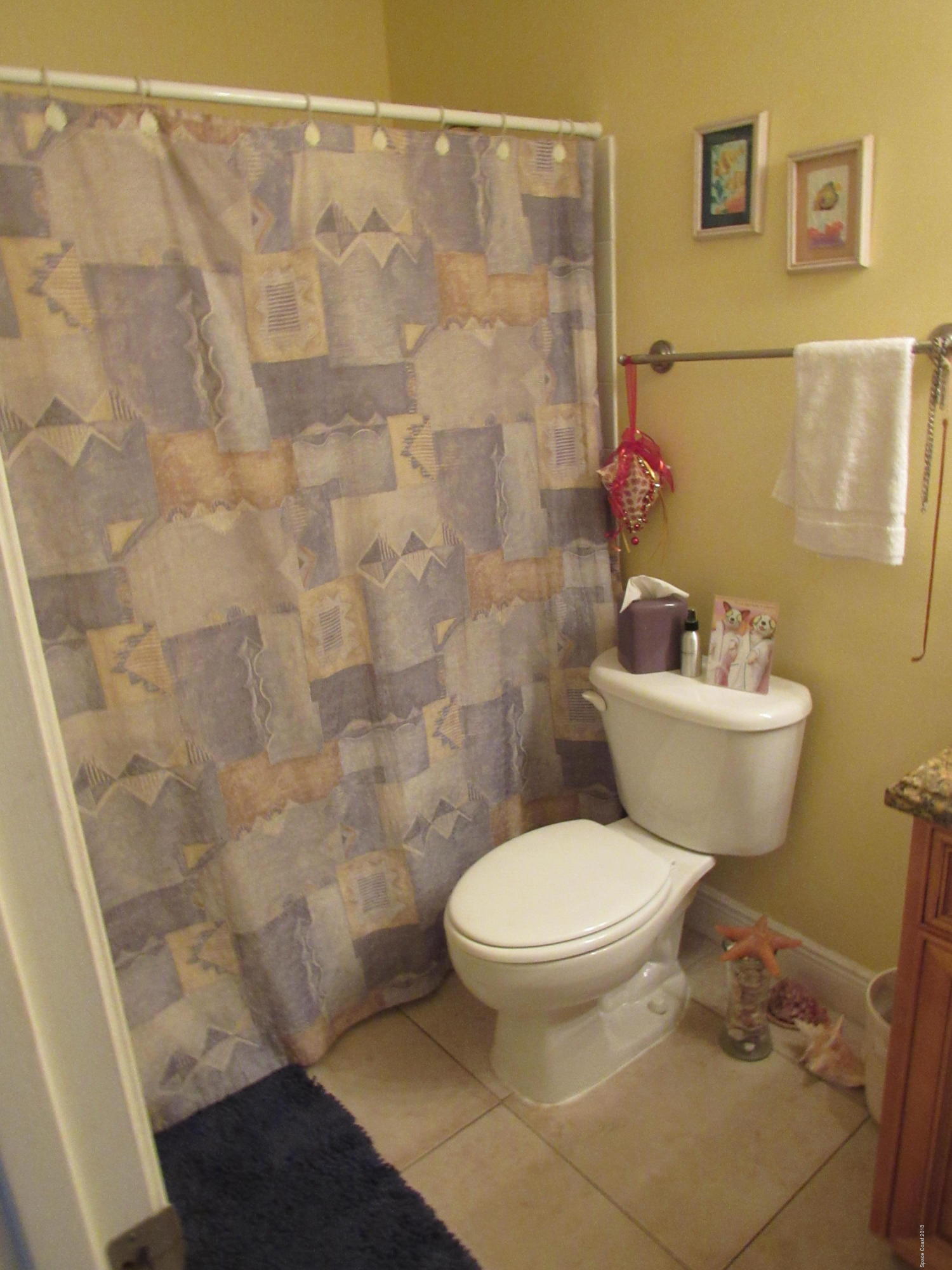 7667 North Wickham Road, Unit 111 Melbourne, FL 32940 - Photo 9 of 21 Guest Bathroom
