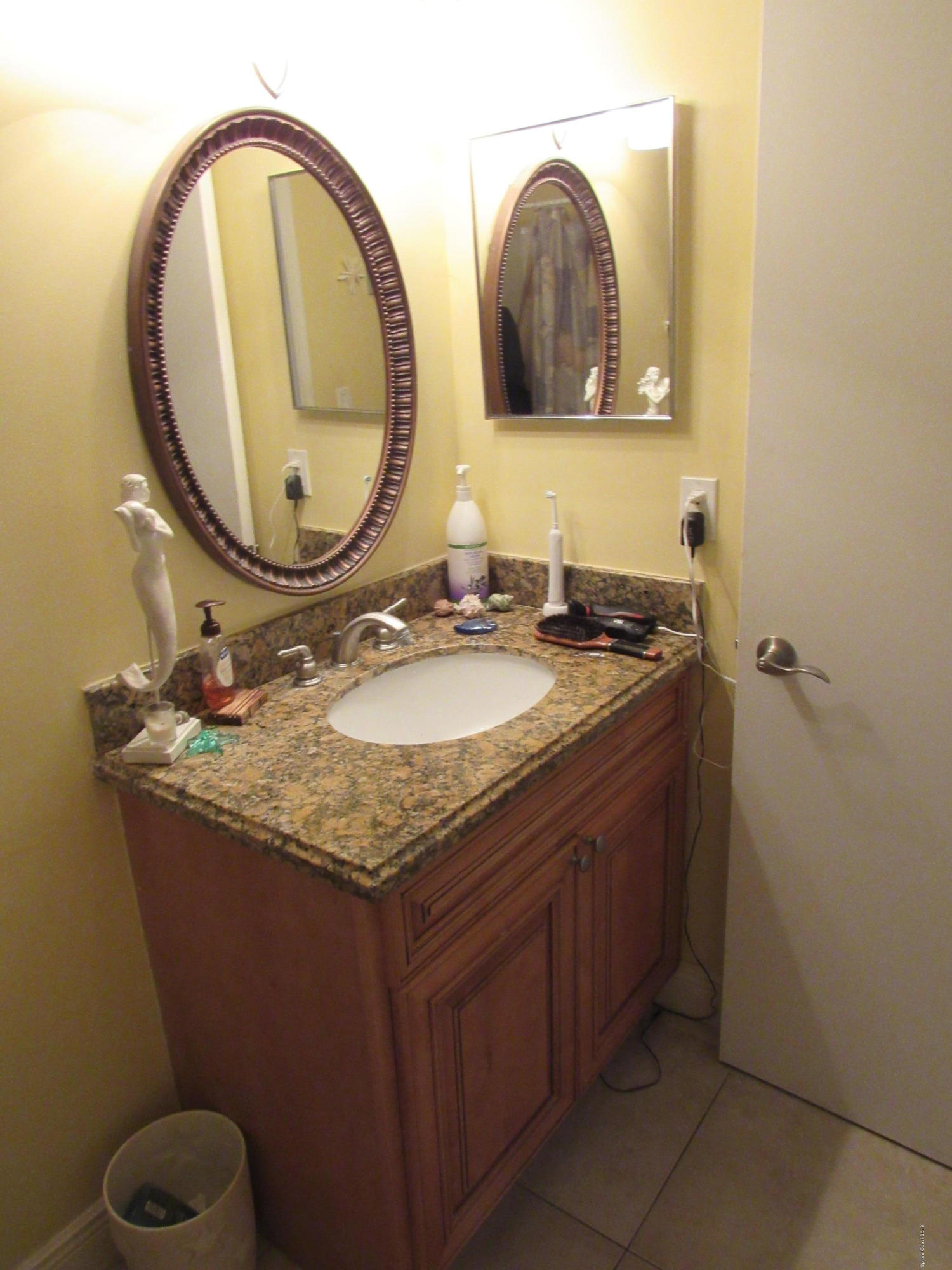 7667 North Wickham Road, Unit 111 Melbourne, FL 32940 - Photo 10 of 21 Guest Bathroom