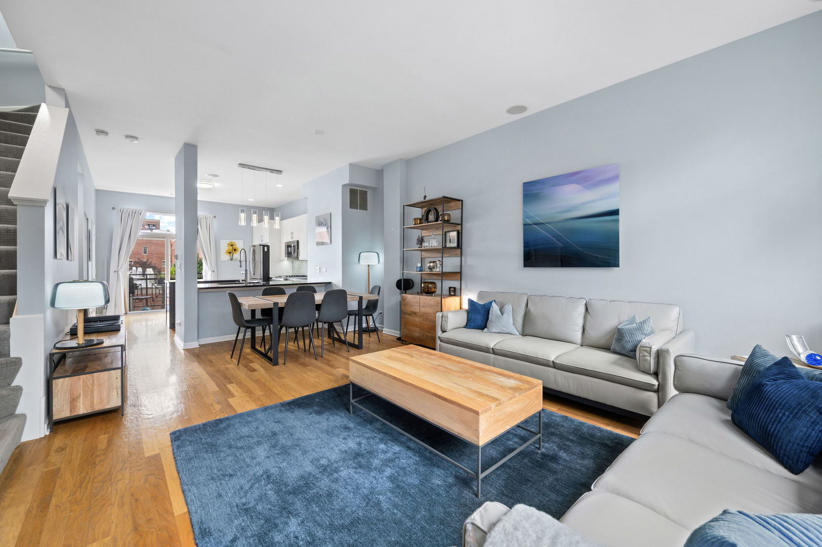 813 West University Lane Chicago, IL 60608 - Photo 10 of 33 a living room with furniture and a flat screen tv