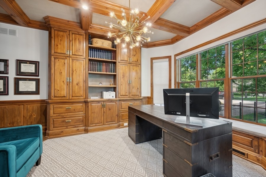 502 Willow Road Winnetka, IL 60093 - Photo 18 of 37 a kitchen with a sink stove and cabinet