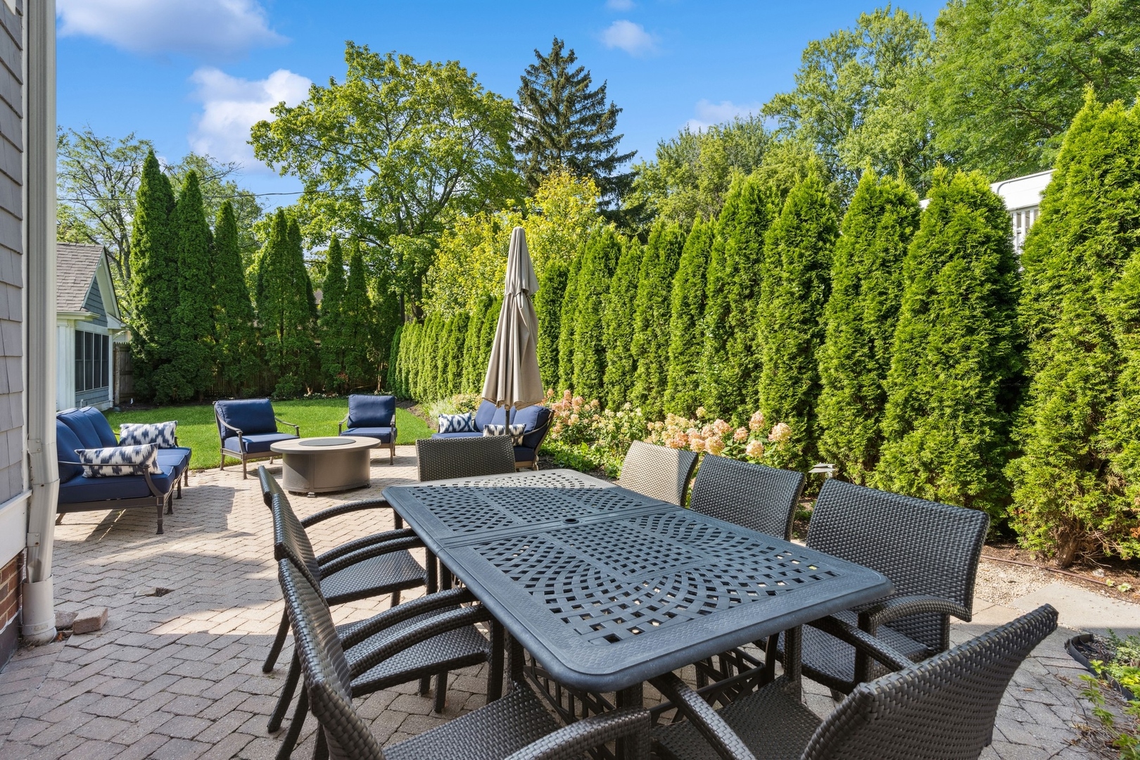 502 Willow Road Winnetka, IL 60093 - Photo 33 of 37 a view of a patio with a table and chairs