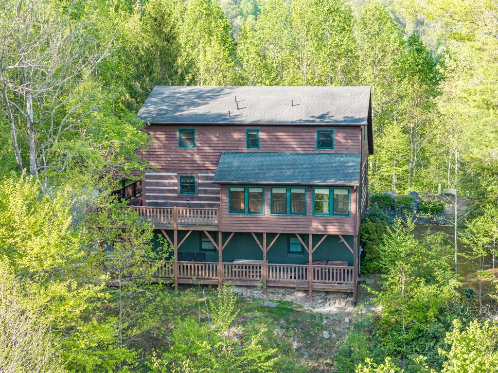 197 Woodby Ridge Road Vilas, NC 28692 - Photo 2 of 45 an aerial view of a house with balcony