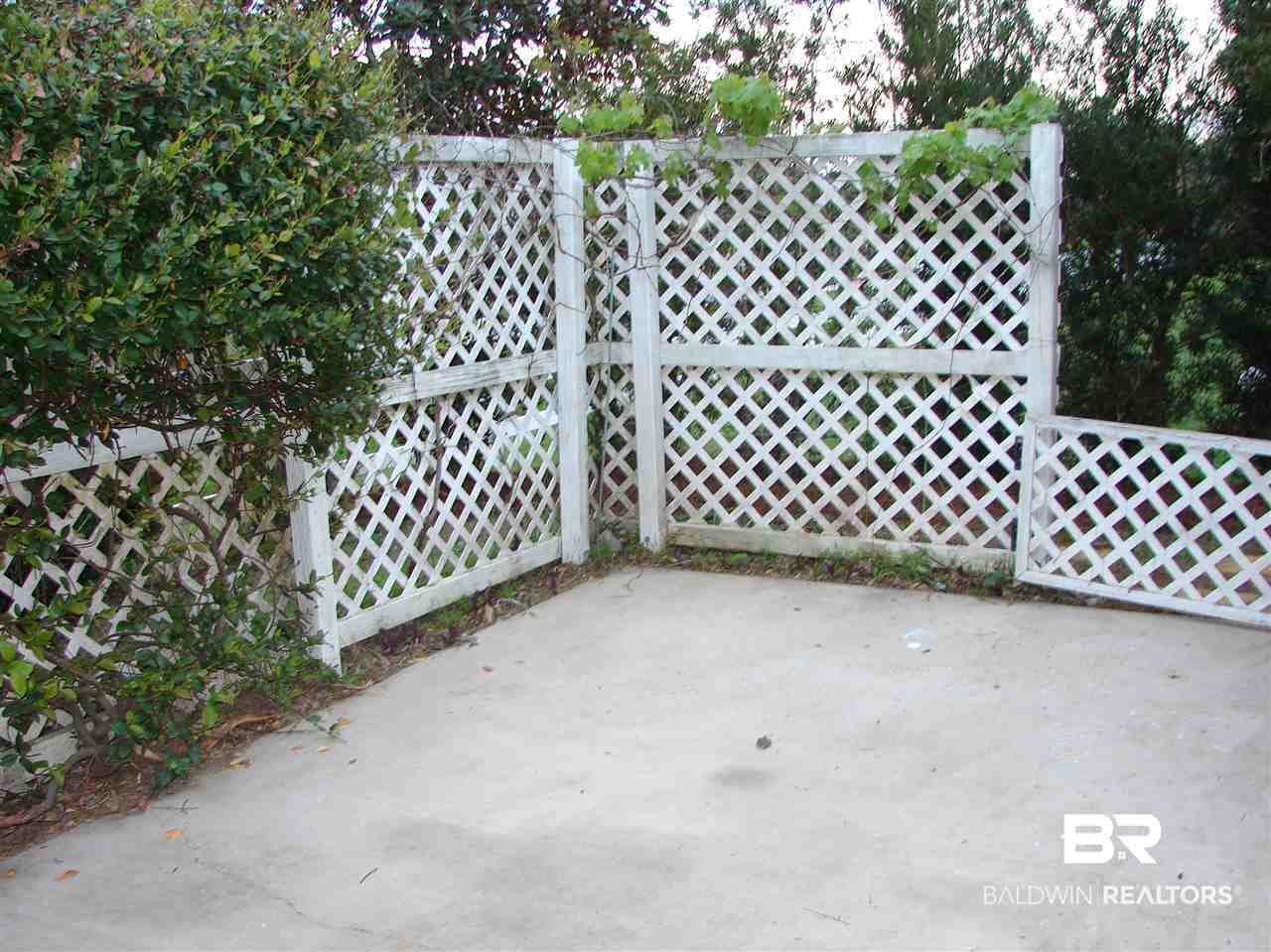 22727 Respite Lane Foley, AL 36535 - Photo 14 of 27 Open back porch area