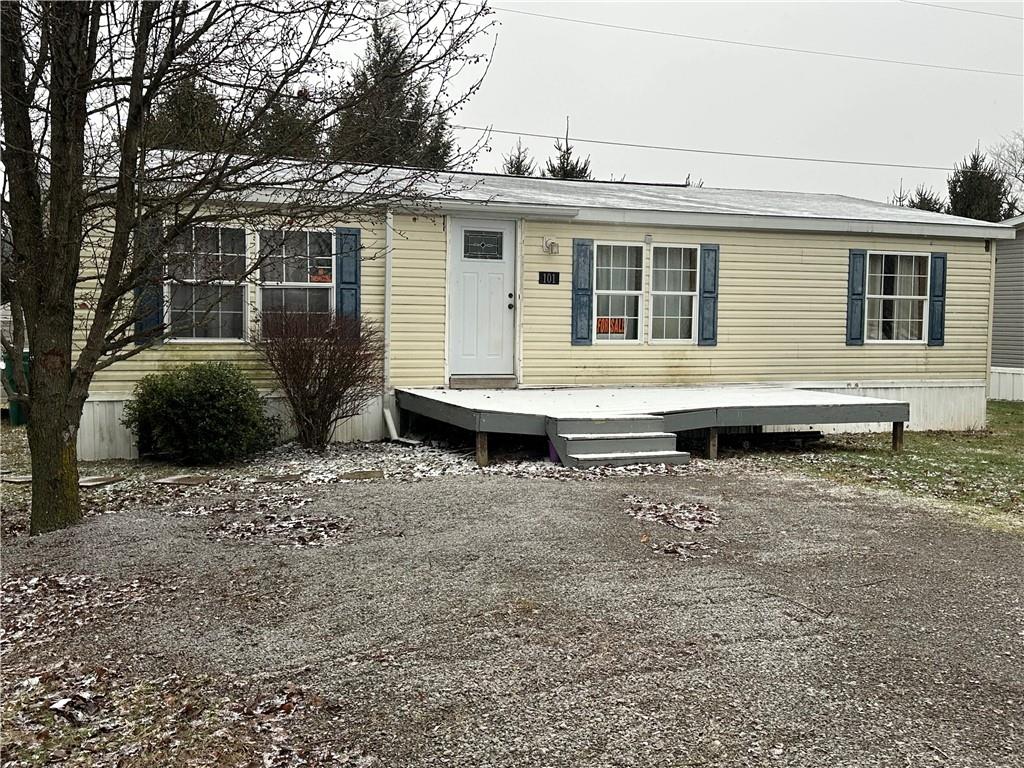 101 Haylees Lane Butler, PA 16002 - Photo 4 of 14 a front view of a house with a yard