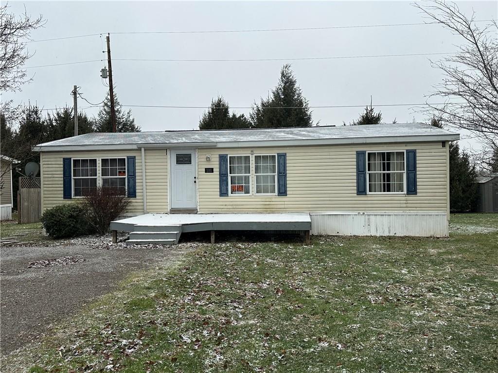 101 Haylees Lane Butler, PA 16002 - Photo 5 of 14 a front view of a house with a garden