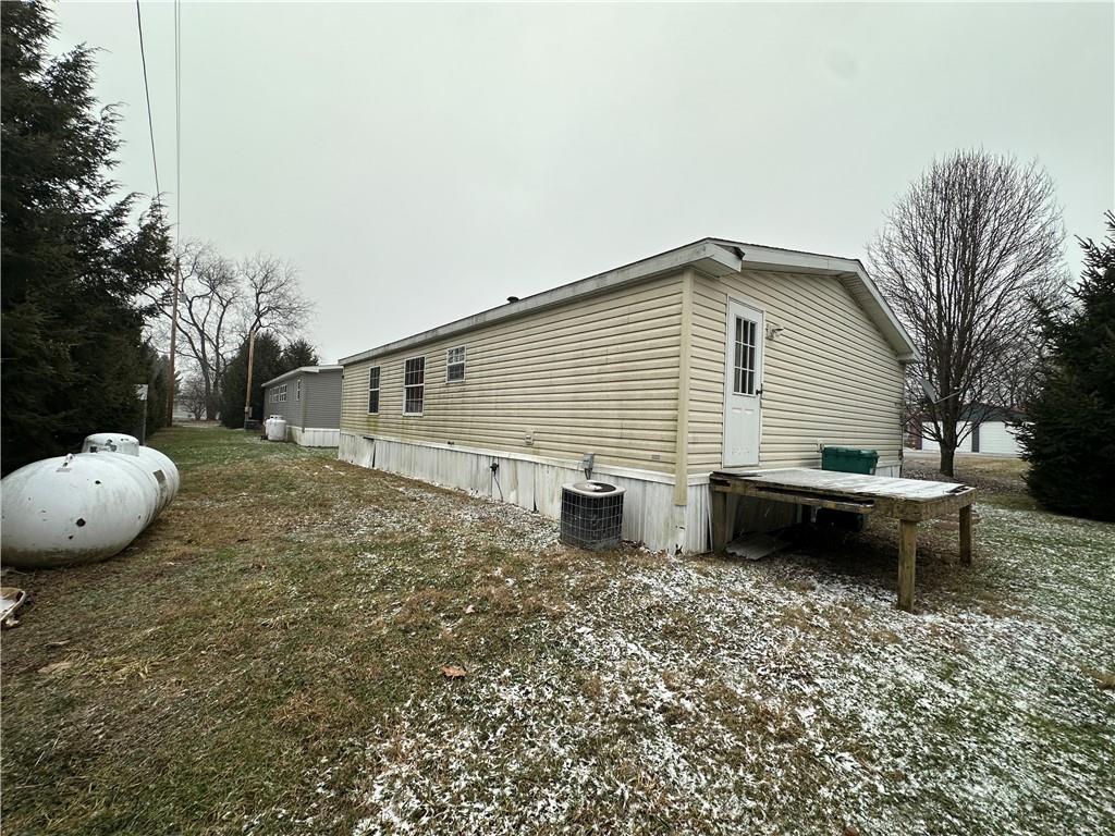 101 Haylees Lane Butler, PA 16002 - Photo 7 of 14 a view of a house with a backyard and sitting area