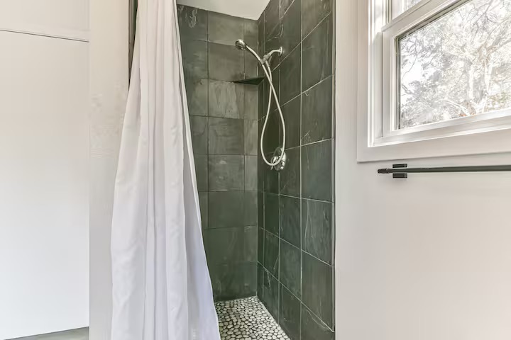 620 Windy Hills Road Dripping Springs, TX 78620 - Photo 22 of 30 Home 2 - Bathroom with a shower stall.