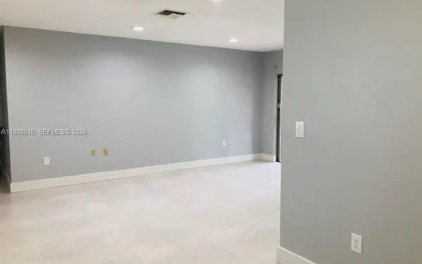 an empty room with a workbench