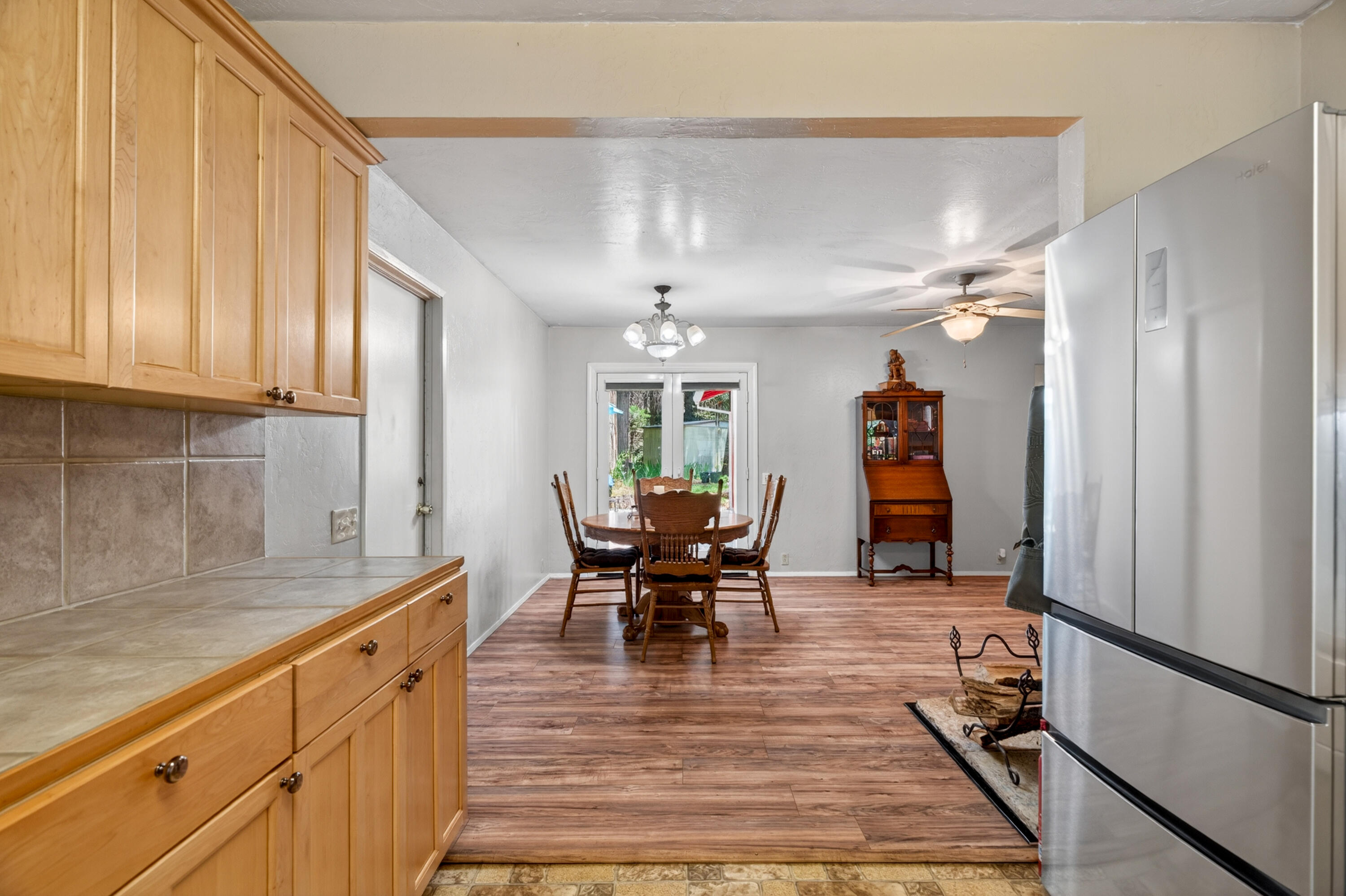 8015 Starlite Pines Road Shingletown, CA 96088 - Photo 14 of 38 a kitchen with stainless steel appliances granite countertop a refrigerator and a sink