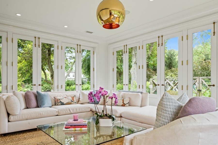 40 Woodley Road Winnetka, IL 60093 - Photo 14 of 60 a living room with furniture and a large window