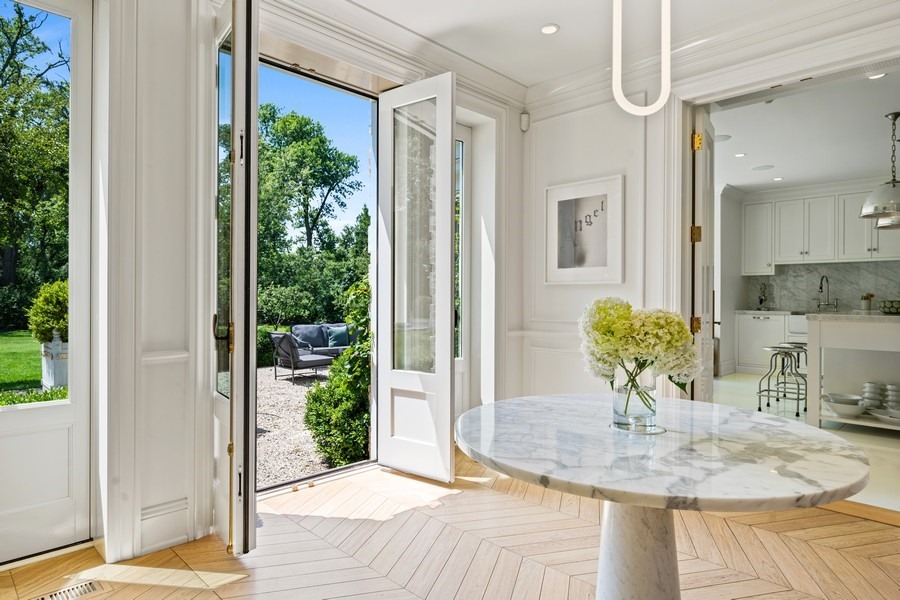 40 Woodley Road Winnetka, IL 60093 - Photo 17 of 60 a view of a livingroom with furniture and front door