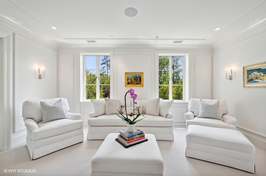 40 Woodley Road Winnetka, IL 60093 - Photo 38 of 60 a living room with furniture and a large window