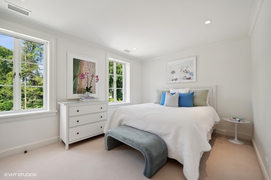 40 Woodley Road Winnetka, IL 60093 - Photo 43 of 60 a bedroom with a bed and window