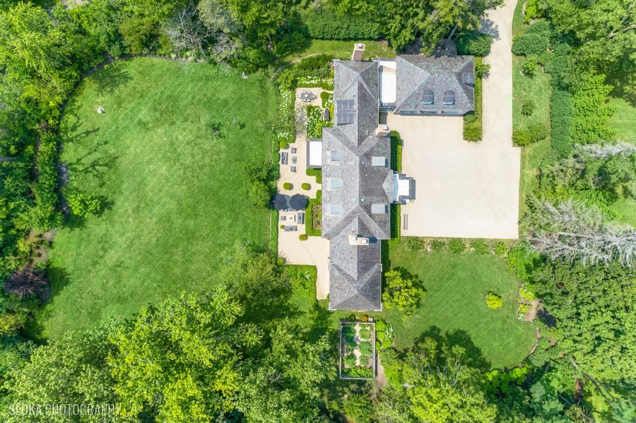 40 Woodley Road Winnetka, IL 60093 - Photo 54 of 60 an aerial view of residential house with outdoor space and trees all around